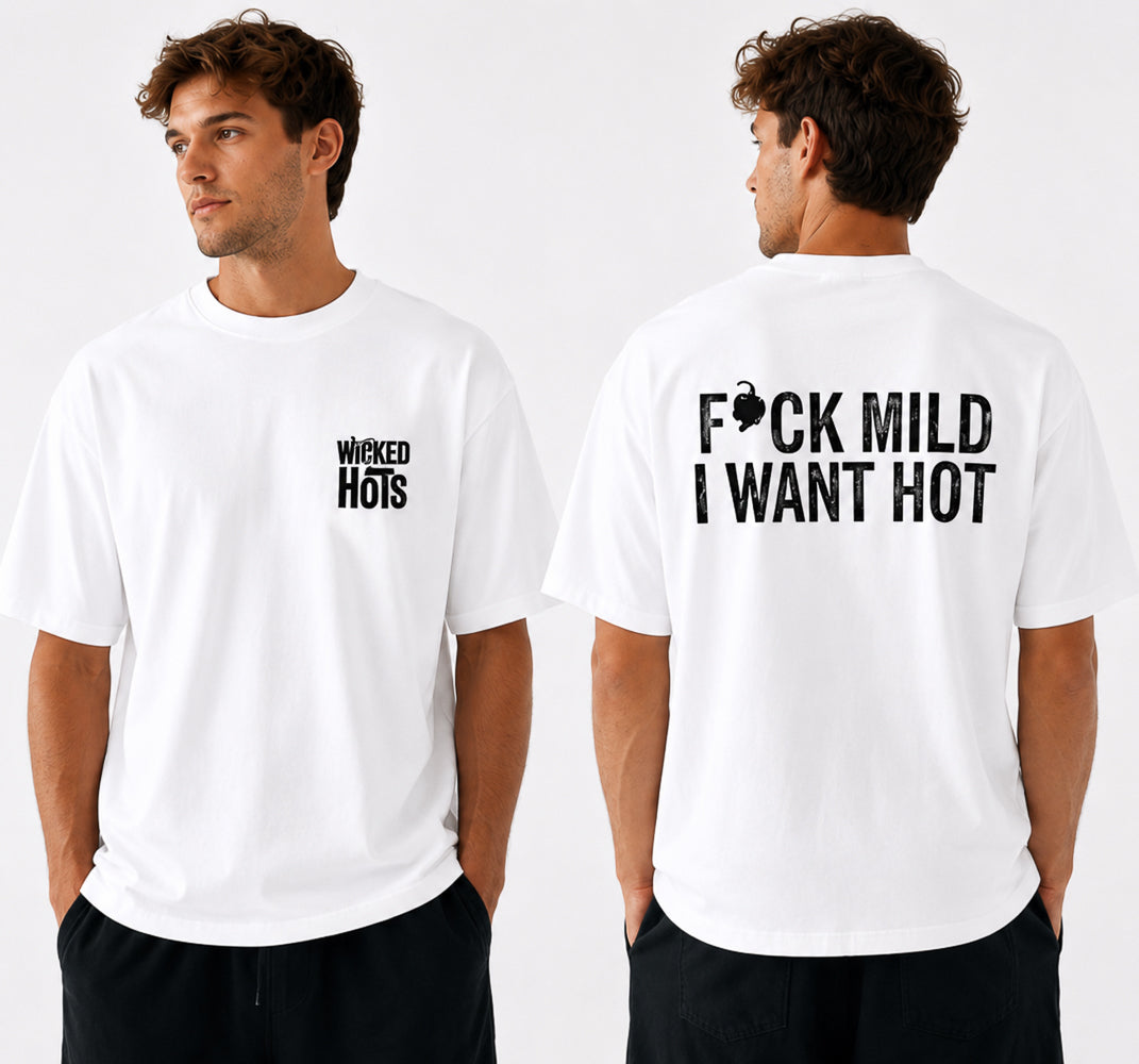 Model wearing white wicked hots fuck mild I want hot t-shirt.  great present for fathers day, mothers day or Christmas for anyone that loves chillies in New Zealand